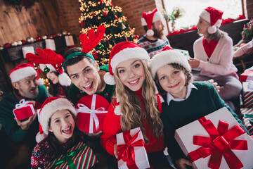 Portrait of big peaceful family toothy smile hold giftbox festive christmas time together flat...