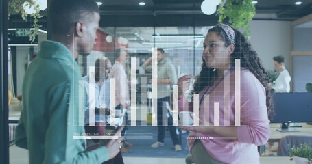 Image of financial data processing over diverse business people in office