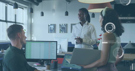 Image of financial data processing over diverse business people in office