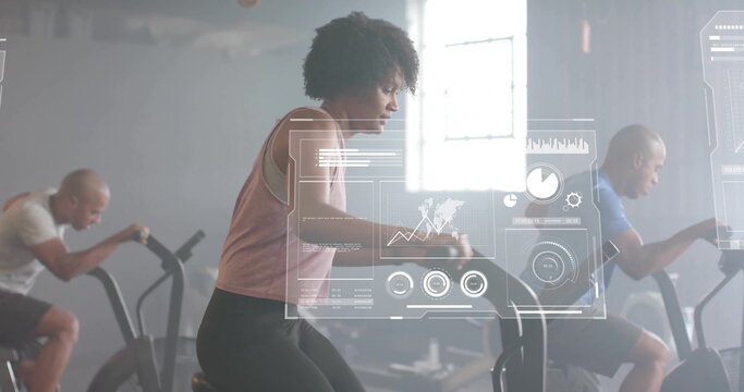 Image of financial data processing over diverse people using elliptical bikes on gym