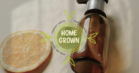 Image of home grown text and logo over lemon slice and beauty oil pump bottle