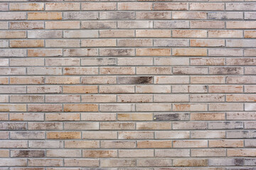 Background from a wall made of light brown clinker bricks