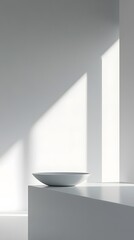 Fototapeta premium A minimalist scene featuring a simple white bowl on a sleek surface.