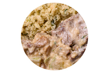 Bowl of food with beef, bulgur, tomatoes, zucchini and sauce