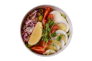 Salad with tuna pieces, boiled egg, cherry tomatoes, lettuce