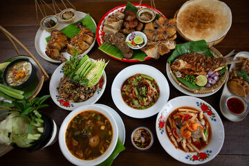 Set of Thai food, papaya salad or spicy salad somtum Thailand on the wooden table, thai spicy food