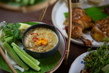 Set of Thai food, papaya salad or spicy salad somtum Thailand on the wooden table, thai spicy food