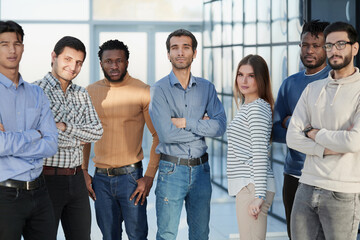 Were all different but as a team we fit together. Portrait of a diverse group of businesspeople in the office.