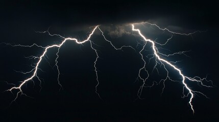Dramatic lightning bolts illuminating a dark stormy sky.