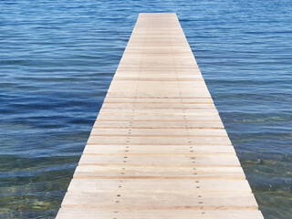 Fototapeta premium Wooden pier on the background of the sea.