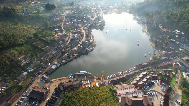 Enjoy the beauty of the lake and the beautiful morning scenery at Baan Rak Thai, Mae Hong Son Province, Thailand Asia