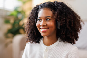 Hair care, portrait of african american girl smiling happy with her afro hair it home