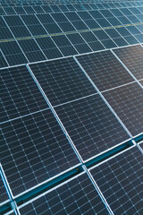 Rows of solar panels generating renewable energy outdoors