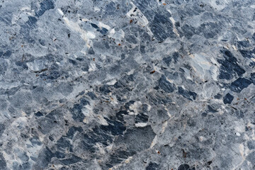 Naklejka premium Polished marble floor with a smooth finish, showcasing luxury and durability in modern interiors