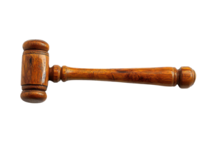 A wooden gavel typically used in courtrooms to signify authority and order.