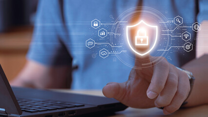 Businessman holding shield protect icon. Protection network security computer and safe your data concept, lock symbol, concept about security, cybersecurity and protection against dangers.