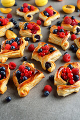 Homemade puff pastry pies with fruit