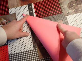 Origami jewelry box made of colored papers. Step 2 from 12
