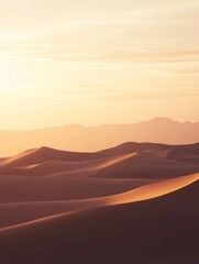 Naklejka premium Golden sand dunes bathed in the warm glow of the setting sun.