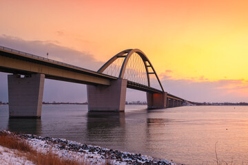 Naklejka premium Fehmarn Sound Bridge in sunset