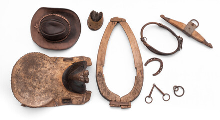 wooden horse saddle and collar isolated on white background
