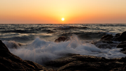 Sunset with waves in corse