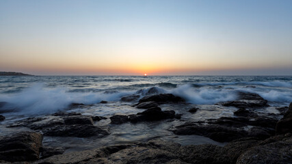 Sunset with waves in corse