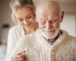 Nurse helping an elderly man put on a sweater, a gesture of care and warmth, nursing home, personal assistance. Nursing home residential care concept.
