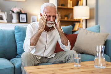 Headache, senior man and stress in home for mistake, mental health and brain fog in retirement....