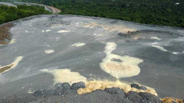 Huge open mine at the brink of the rainforest in Brazil