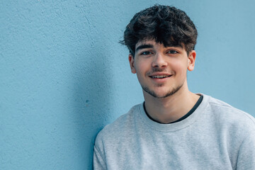 teenager portrait on wall outdoors