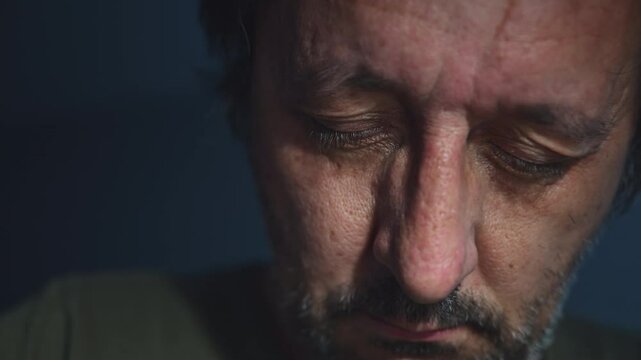 Sickness and dizziness, closeup of male face with eyes closed, 4K