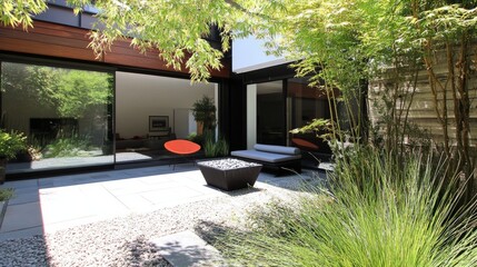 Minimalist patio with contemporary seating, sophisticated plants, and clear windows, offering a peaceful garden retreat experience