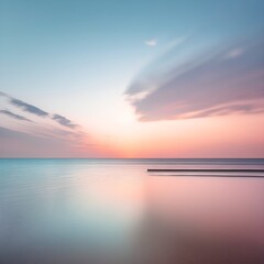 Naklejka premium Soft Tones and Tranquility: Sunset Beach Photography