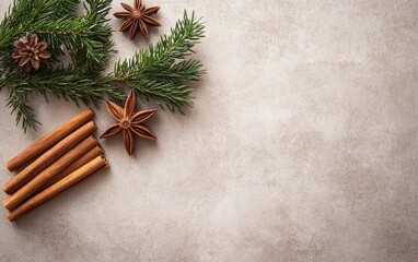 Fototapeta premium A cozy minimalist flat lay featuring cinnamon sticks and evergreen sprigs for festive holiday wishes and seasonal warmth