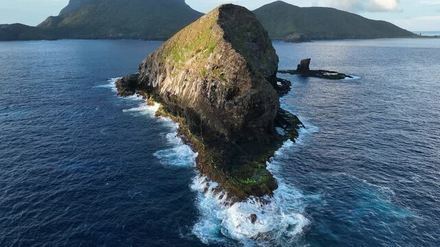 Aerial footage of Lord Howe island around Mutton Bird Island at sunrise morning