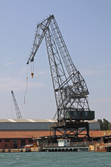 Tall Crane at Shipyard Dock in Venice Italy