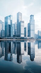 Fototapeta premium A modern skyline reflecting in calm waters, showcasing towering buildings and a serene urban landscape.