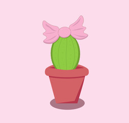 cactus with a pink bow on a light pink background