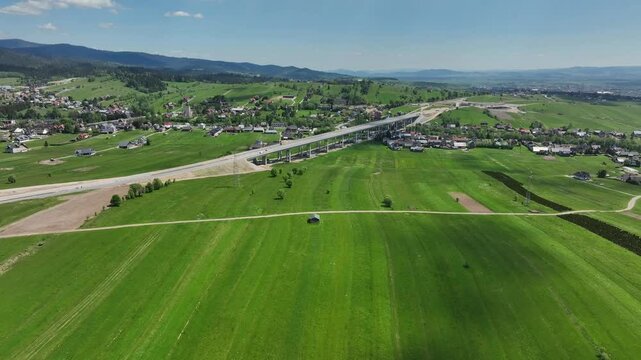 Highway and bridge modern structure development, construction site in Poland aerial panorama