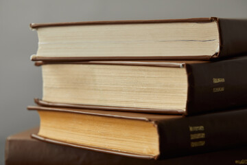 Books are thoughtfully stacked, representing the journey of learning and personal growth in a tranquil setting.