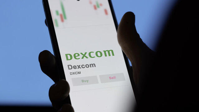 April 09th 2024 , San Diego, California. Close up on logo of Dexcom on the screen of an exchange. Dexcom price stocks, $DXCM on a device.