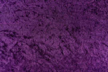 Rich deep grape purple velvet fabric texture with soft, plush pile