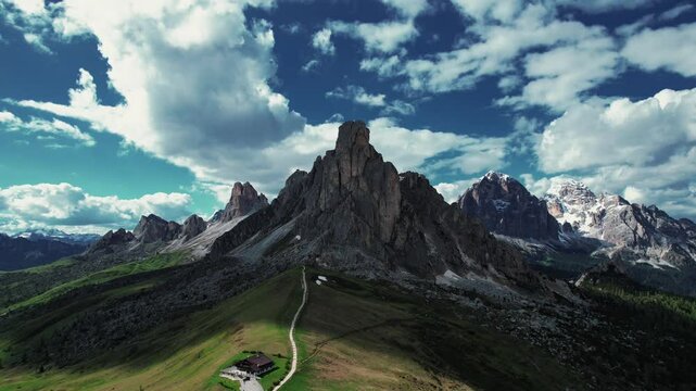 4k Drone Descending Pan Tilt Of Ra Gusela Mountain At Passo di Giau, Dolomites In Northern Italy