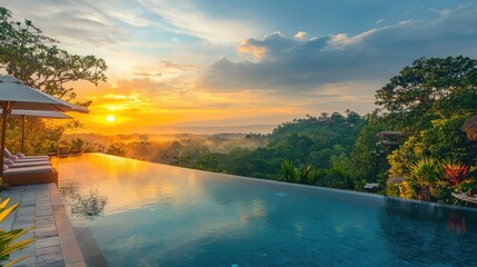 Stunning sunset view over an infinity pool surrounded by lush greenery, capturing the essence of tranquility and luxury.