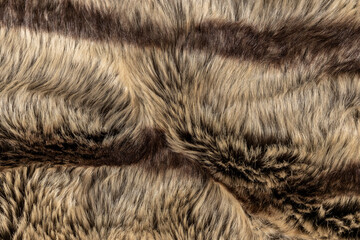 Faux Fur Fabric Texture with luxurious rich brown and beige color palette and stripes