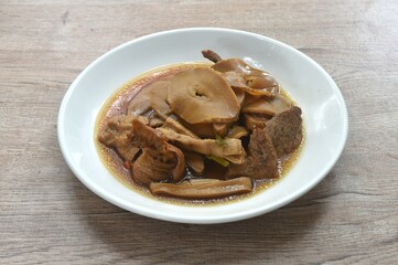 boiled slice Chinese bamboo shoot with ith gluten and tofu vegetarian food on plate 