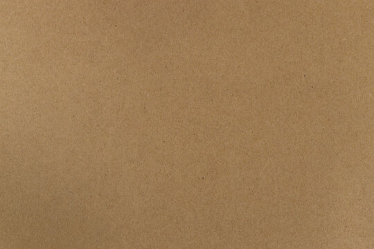 Plain brown cardboard with visible surface texture and slight variations in color
