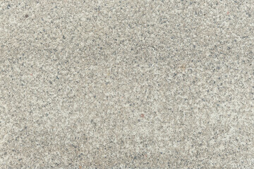 Modern rough concrete patio paving slab surface graphic design background texture in weathered light cement gray