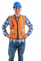 vertical Construction worker with hands on hips wearing orange vest and safety helmet